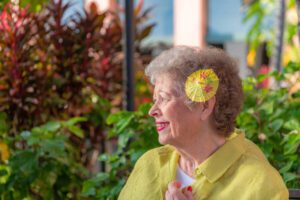 a senior woman at a restaurant in Hawaii